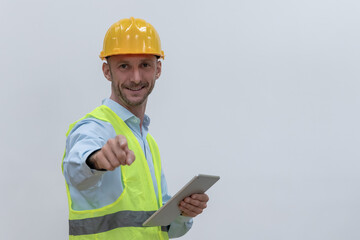 Portrait young Caucasian engineer man with safety helmet and vest on white background