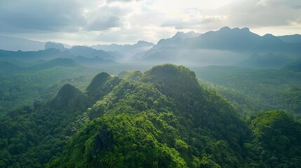 Naklejka premium majestic aerial view of untouched wilderness landscape with rugged mountains and lush forests drone photography