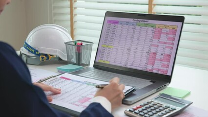 Expert woman asian female people review data number costing managerial account prepare monthly actual cost variance report at tax audit office. ESG sheet budget control ERP process service project.