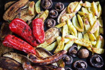 Macro shot Grilled vegetables of potato, mushrooms, eggplant and red pepper.