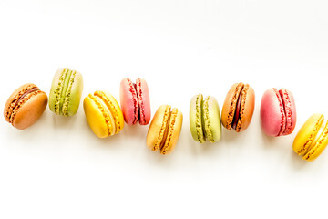 sweet dessert pattern with macarons on white background flat lay mockup