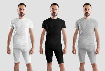 Mockup of white, black, heather compensation suit on bearded man, t-shirt, shorts, isolated on background, front, set