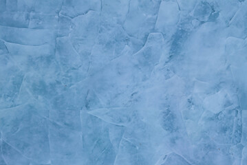 Texture of the cracked ice. Winter background