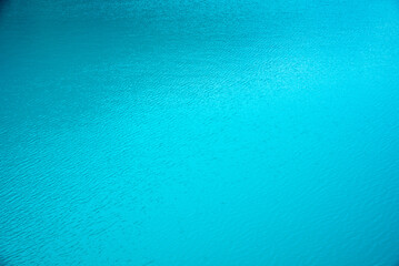 turquoise water background with small  ripples
