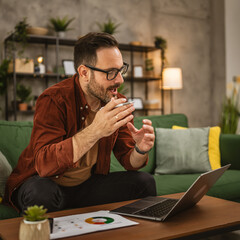 Adult man work from home and have consultation via video call