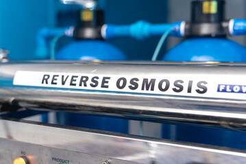 Detailed view of a reverse osmosis water filtration system used in a modern water refilling station...