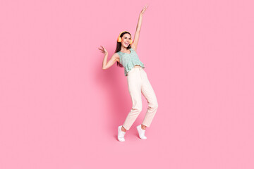 Photo of cheerful good mood crazy woman wear stylish clothes listen music empty space isolated on...
