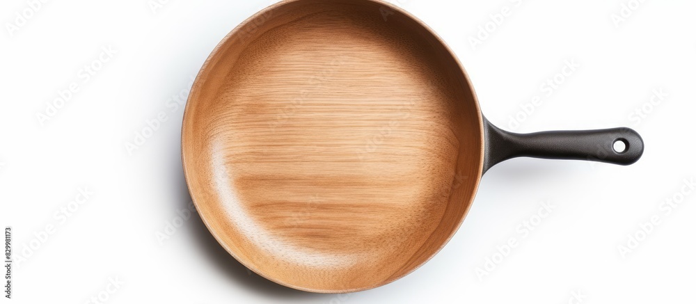 Poster a cast iron frying pan is shown in a copy space image against a white isolated background