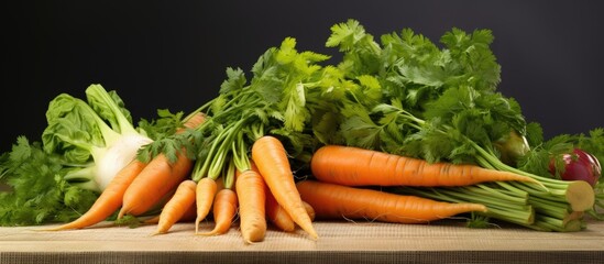 A copy space image of organic carrots in various shapes grown at home seen in a close up view