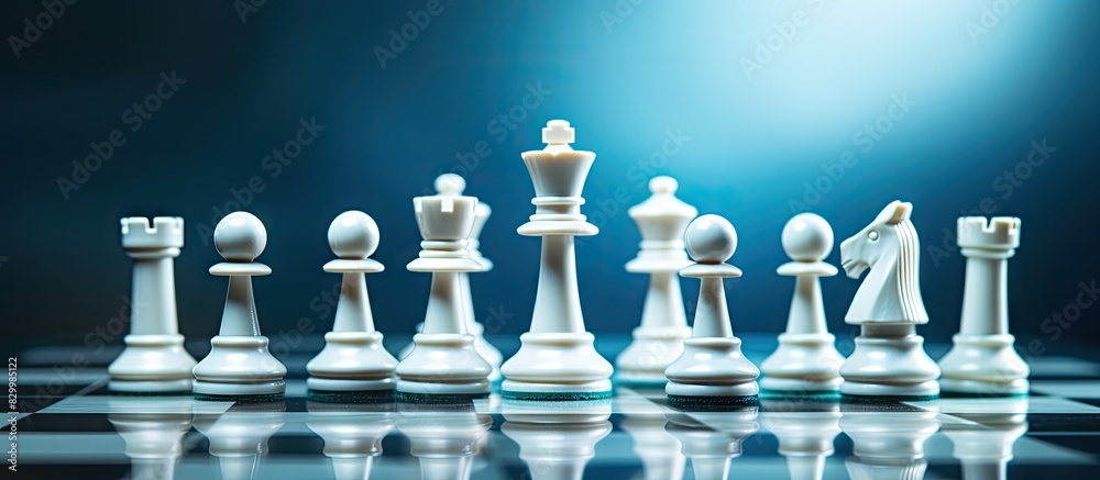Poster Chess pieces set up on a chessboard with ample copy space image