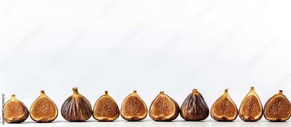 Aufkleber A minimal composition of whole dried figs in a row isolated on a light background providing copy space for additional content