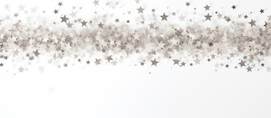 A festive and celebratory atmosphere is created with a white background adorned with scattered silver star shaped confetti and big bright glitter stars making it ideal for a copy space image - Powered by Adobe