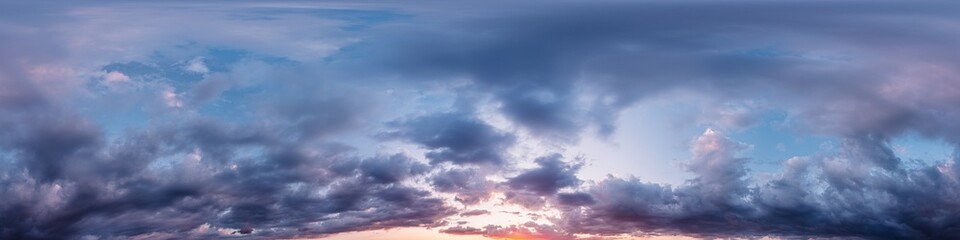 360 panorama of glowing sunset sky with bright pink Cumulus clouds. HDR 360 seamless spherical panorama. Full zenith or sky dome sky replacement for aerial drone panoramas. Climate and weather change.