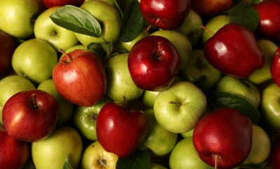 Fresh ripe red and green apples as background, top view