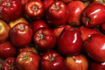 Fresh ripe red apples as background, top view