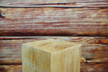 Wooden podium stand for product display on wooden background