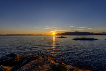 Bowen and Vancouver Island, at sunset, twilight, or dusk on the Strait of Georgia or the Salish Sea