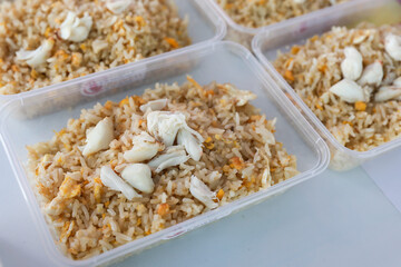 Fried rice with crab fried ricefor take home packing in plastic box