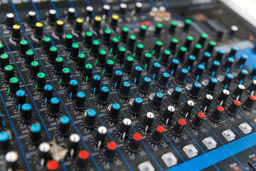 Obraz premium Professional audio mixing console with faders and adjusting knobs, TV equipment at party