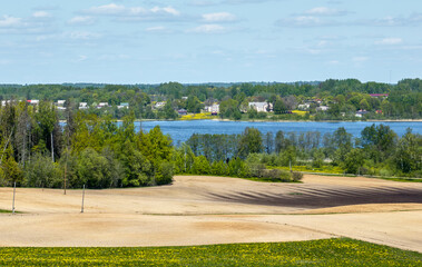 Fototapeta premium Next to Aulejas lake (Aulejs). Village Auleja --Landscape, Latvia, in the countryside of Latgale.