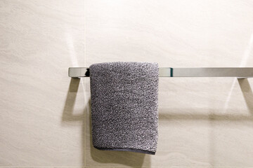 Closeup  towel hanging on clothesline in the bathroom with space for texts
