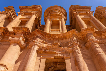 Grand Ad Deir Monastery in Petra, Jordan: Majestic Scale and Intricate Nabatean Architecture Carved into Sandstone Cliffs © FelixB