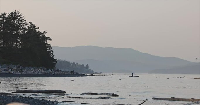 Dusk settles on Salish Sea riverbank