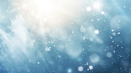 Soft gradient blends of blue and grey with light flares and snow-like specks in a winter abstract backdrop