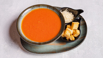 Tomato soup bowl top view isolated