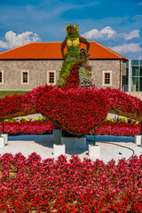 Vibrant floral sculpture in Kladovo, Serbia on a bright summer day