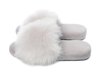 Pair of soft slippers with fur isolated on white