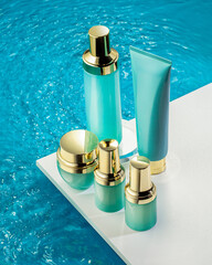 Set of Turquoise hydrating skincare products staing  on rippling water background