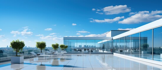 Portrait photo of glass office building exterior under clear sky and trees