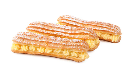 Delicious eclairs filled with cream isolated on white