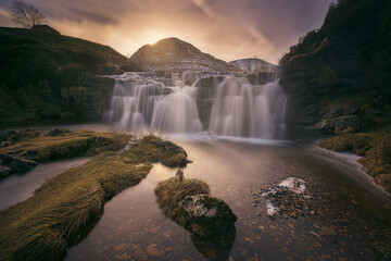 Sunrise at the Guarguero waterfalls, in the Puerto de las Estacas de Trueba