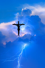 Jesus Christ on the cross, thunder lightning storm dark clouds in the background