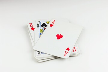 Obraz premium Realistic photograph of a complete Playing cards,solid stark white background, focused lighting
