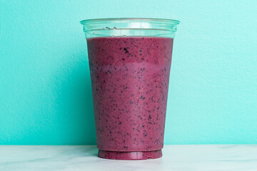 Frozen smoothie in a plastic cup