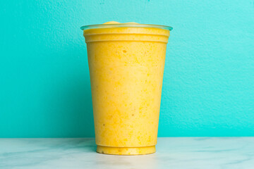 Frozen smoothie in a plastic cup