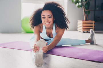 Photo of happy smiling lady activewear enjoying practicing stretching exercises indoors room home...