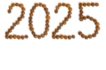 Calendar 2025 from Dry pet food on a white background. Granules of good nutrition for dogs and cats. Food for the animals. Brown homogeneous pieces of dry food in the shape of numbers.