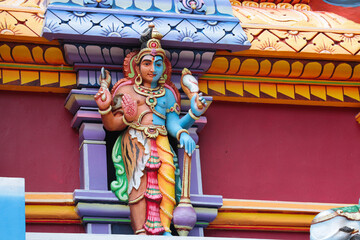 Bas-relief on a Hindu temple - Half god Vishnu, half Shiva.