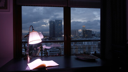 Working at home concept. Creative. Turning on and off the lamp with color change, daily planner and...