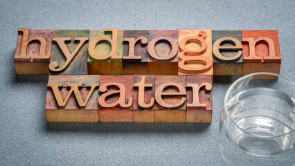 hydrogen water infused with molecular hydrogen gas, text in retro letterpress wood type