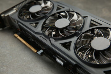 One graphics card on grey table, closeup