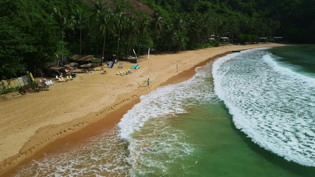 Wave and surfer Beach in the Philippines