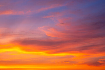 Golden sunset and beautiful clouds formation in the sky