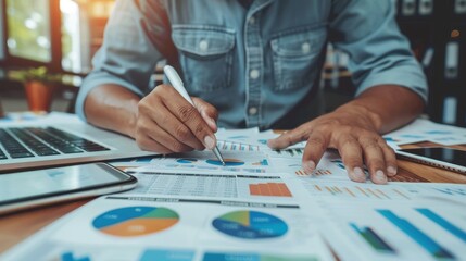 Fototapeta premium Focused man studying digital marketing strategies, close up, determined expression, realistic, Composite, contemporary desk backdrop
