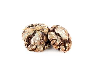 Chocolate cookies in powdered sugar isolated on a white background. Christmas Time.