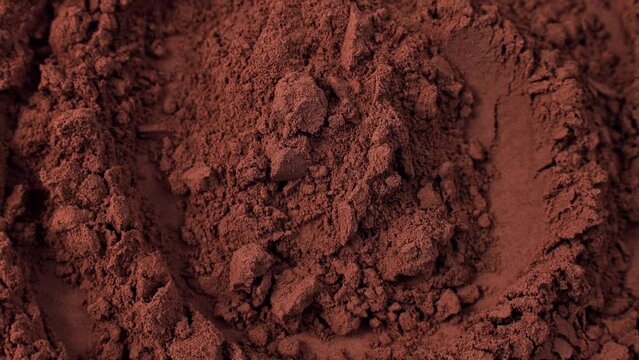 Brown cocoa powder texture circle rotation close up top view